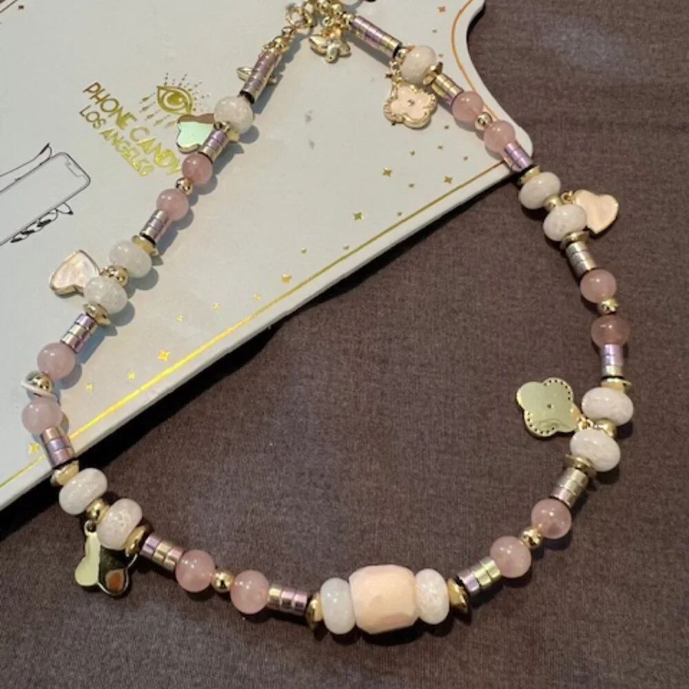 Pink‎ Beaded phone charm, lanyard-style accessory attaches to mobile phone cases